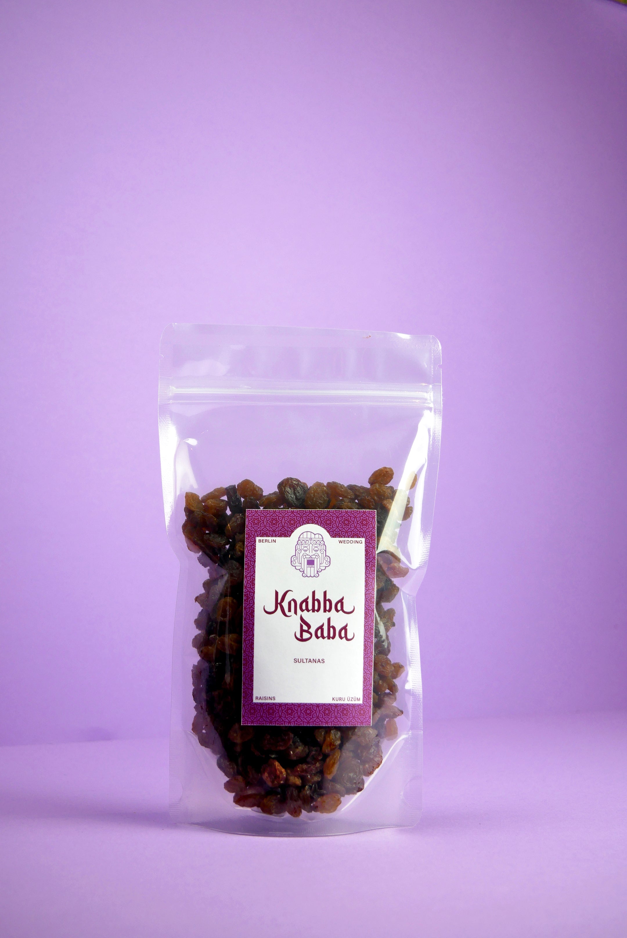 Knabba Baba Rosinen Sultanas 250 g  im wiederverschließbaren Beutel mit lilafarbenem Hintergrund
